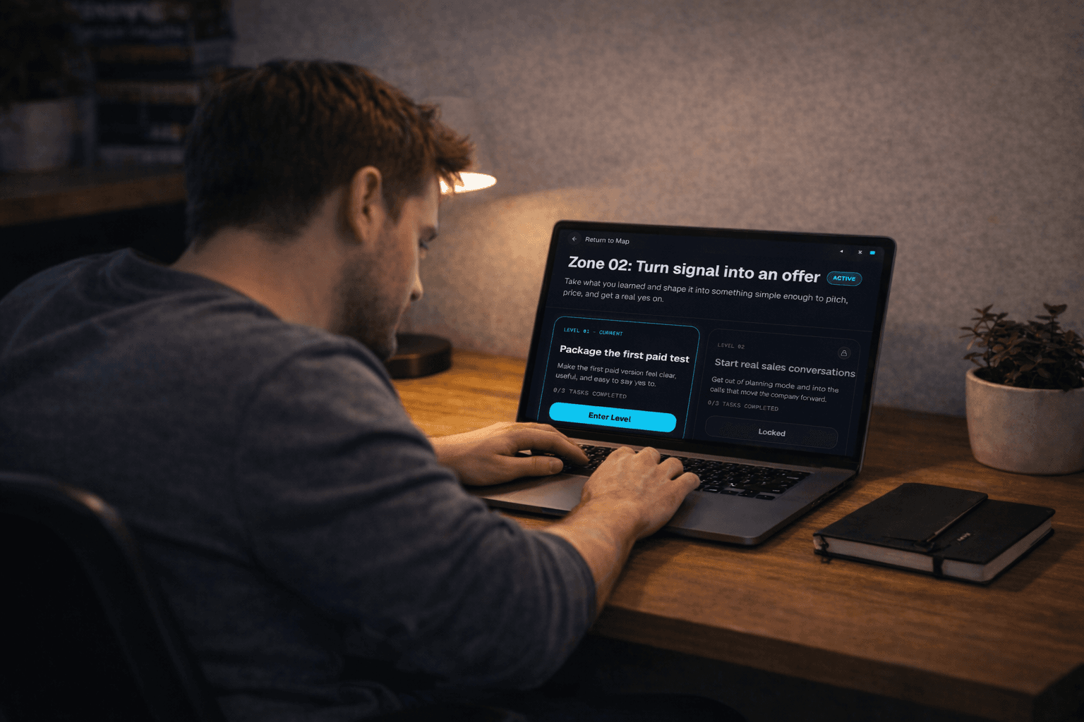 Founder working with Acenxia open on a laptop